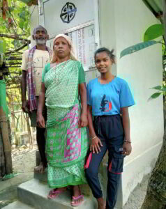 Family with outdoor toilet - KP Yohannan - Gospel for Asia